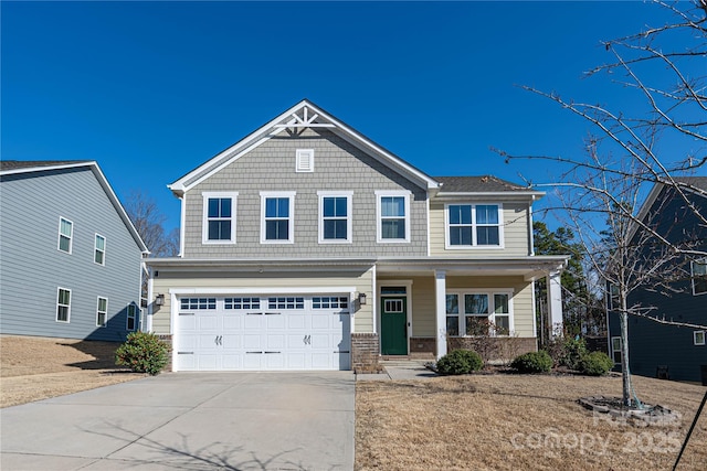 craftsman house featuring concrete driveway, a porch, an attached garage, and brick siding