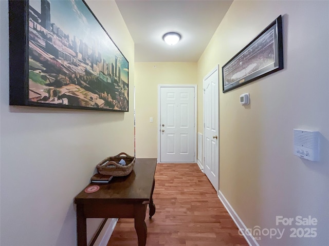 hall featuring light hardwood / wood-style flooring