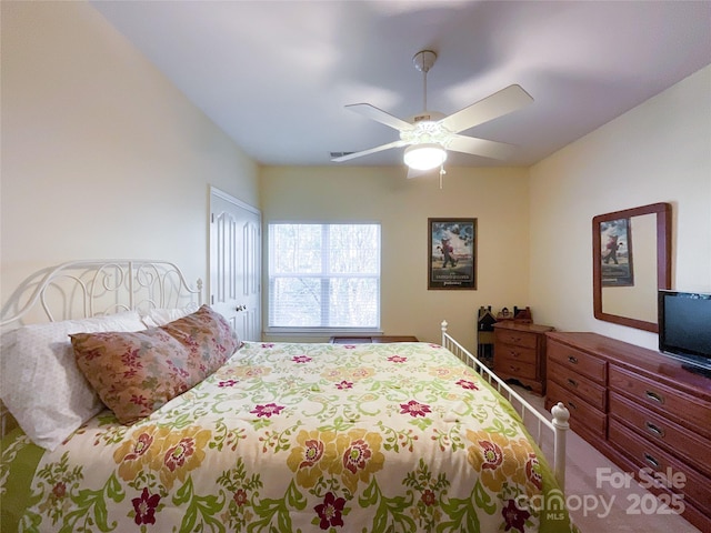 bedroom with a closet and ceiling fan