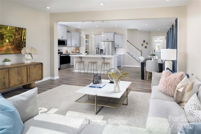 living room with light hardwood / wood-style flooring