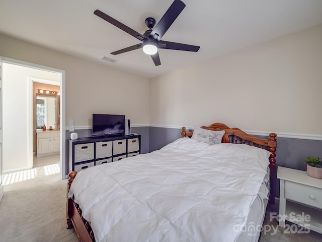 bedroom featuring ceiling fan and carpet