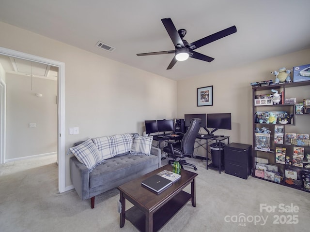 living room featuring light carpet and ceiling fan