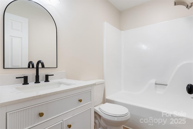 full bathroom with vanity,  shower combination, and toilet