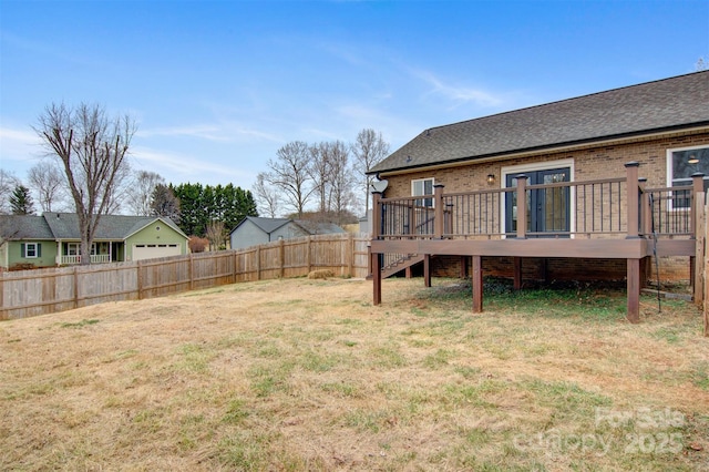 view of yard with a wooden deck