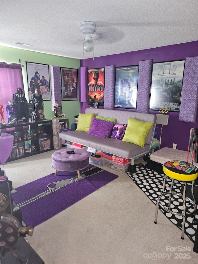 living room with carpet floors and a textured ceiling