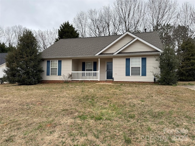 view of front facade featuring a porch and a front lawn