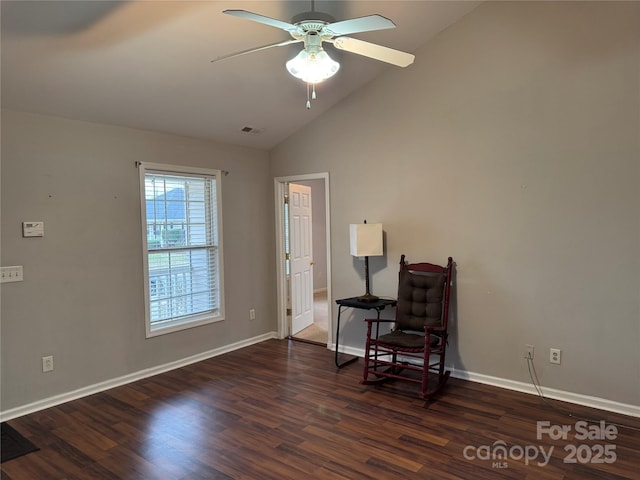 sitting room featuring dark wood-type flooring, ceiling fan, and lofted ceiling