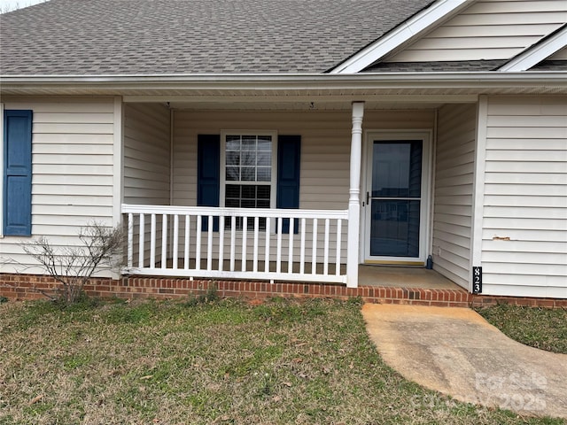 property entrance featuring a porch