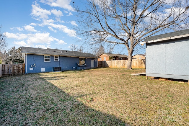 view of yard with central AC unit