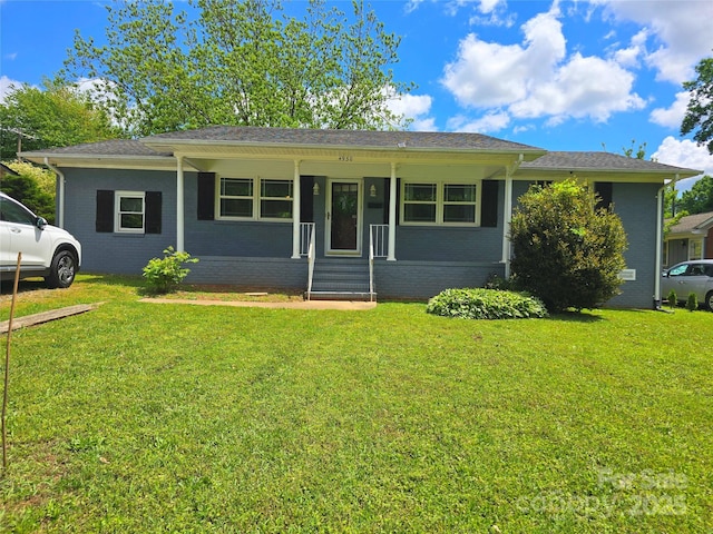 4930 Crestmont Dr, Charlotte, NC 28205 - view of front of house featuring a front yard and brick siding