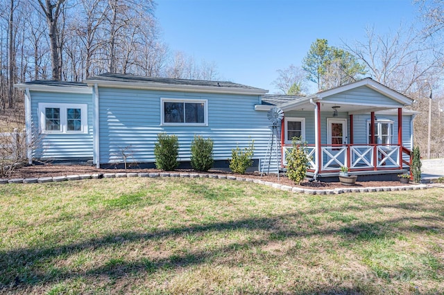 view of front facade with a porch and a front yard