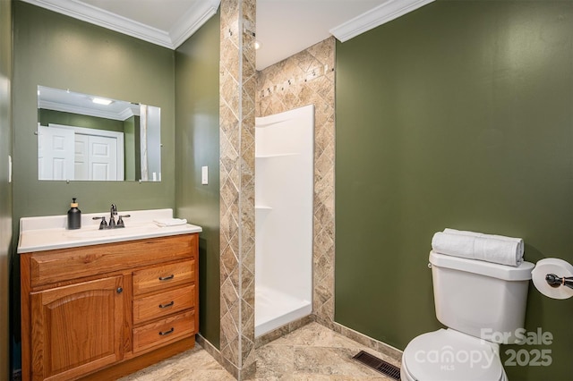 bathroom with crown molding, visible vents, toilet, a stall shower, and vanity