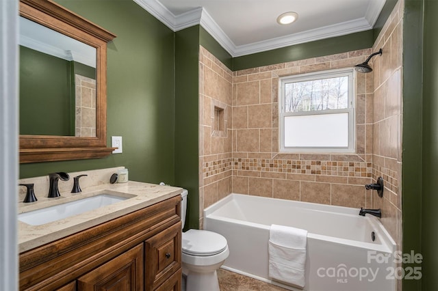 bathroom with toilet, vanity, crown molding, and shower / bathtub combination