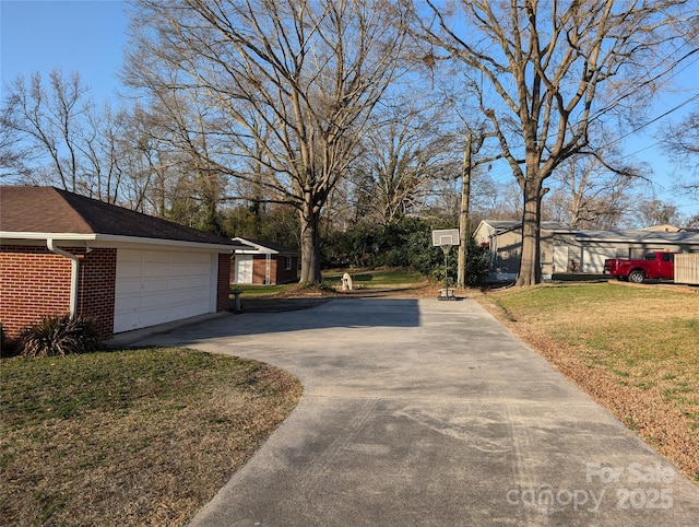 view of side of home with a yard