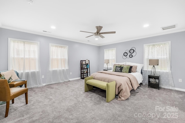 bedroom with multiple windows, ornamental molding, and light carpet