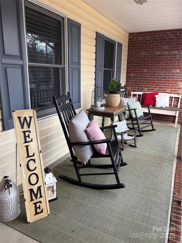 view of patio featuring a porch