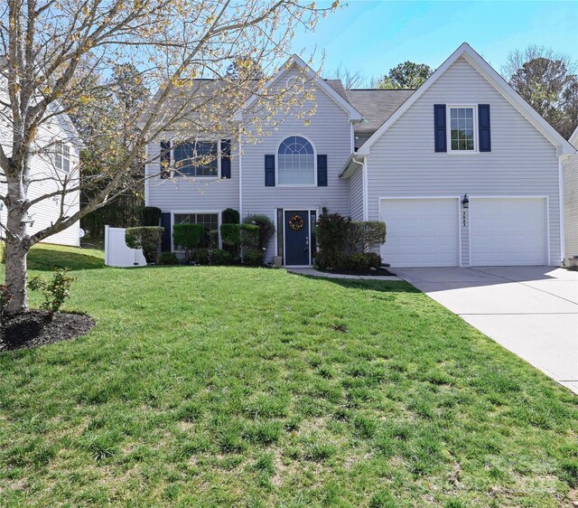 2043 Covered Bridge Ct, Rock Hill, SC 29732 - traditional home with an attached garage, concrete driveway, and a front yard