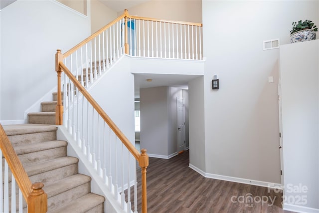 2043 Covered Bridge Ct, Rock Hill, SC 29732 - stairway with wood finished floors, baseboards, and a high ceiling