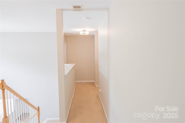 2043 Covered Bridge Ct, Rock Hill, SC 29732 - corridor with an upstairs landing, light colored carpet, and baseboards