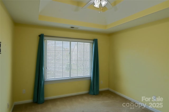 2043 Covered Bridge Ct, Rock Hill, SC 29732 - spare room with ceiling fan, carpet floors, a raised ceiling, and baseboards