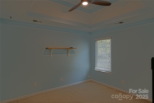 2043 Covered Bridge Ct, Rock Hill, SC 29732 - spare room with a raised ceiling, ceiling fan, light colored carpet, and baseboards