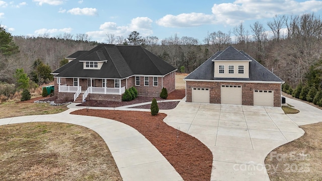 view of front facade featuring a garage and a porch