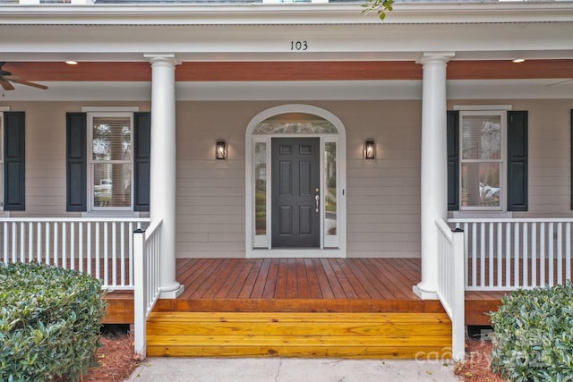 entrance to property featuring covered porch