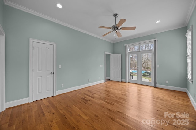 unfurnished bedroom with light wood-type flooring, ornamental molding, french doors, baseboards, and access to exterior