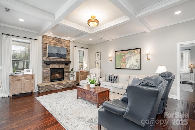 living room with dark wood-style floors, visible vents, coffered ceiling, and beam ceiling