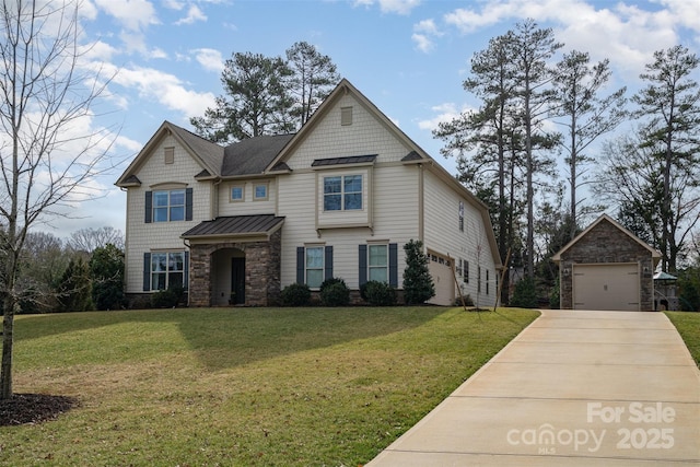 craftsman house featuring a garage, driveway, stone siding, a standing seam roof, and a front lawn