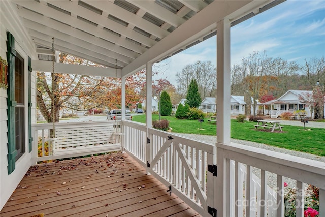 deck featuring a lawn