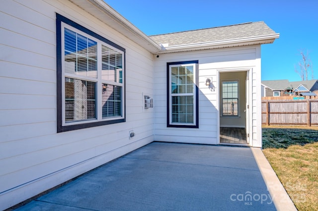 property entrance with a patio area