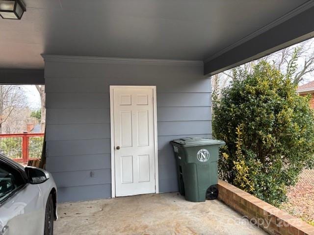 exterior space with a carport