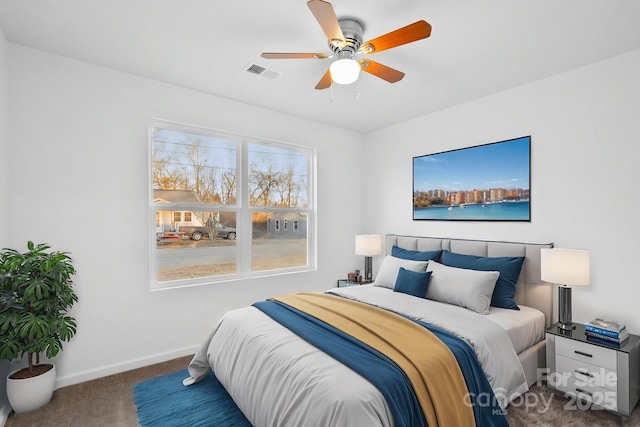 carpeted bedroom featuring ceiling fan