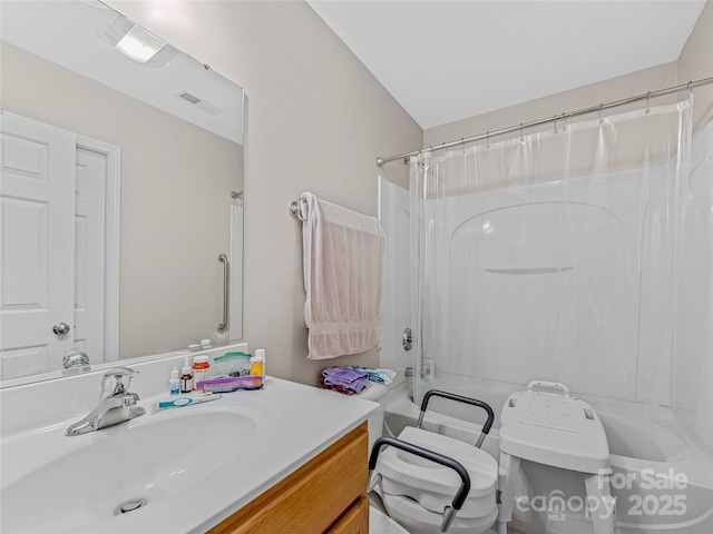 full bathroom with vanity, toilet, and shower / bathtub combination with curtain