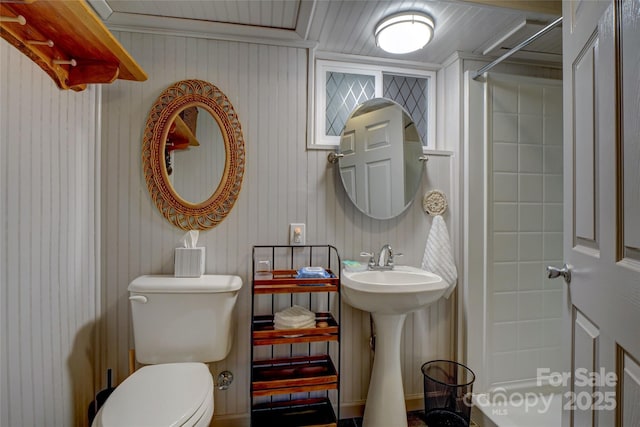 bathroom with sink, toilet, and walk in shower