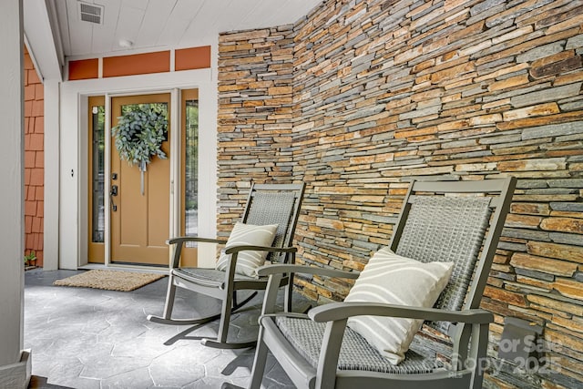 property entrance featuring visible vents