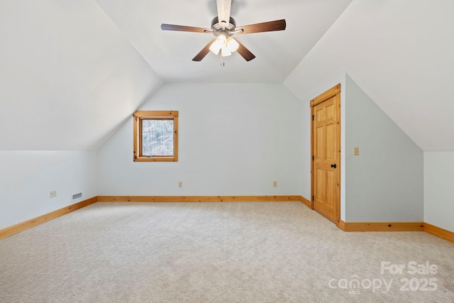 216 Log Gap Rd, Fairview, NC 28730 - additional living space with vaulted ceiling, carpet, baseboards, and a ceiling fan