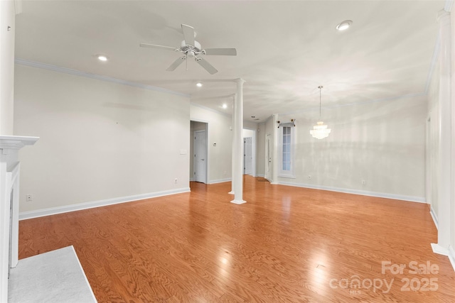 unfurnished living room featuring ornamental molding, decorative columns, ceiling fan, and light wood-type flooring