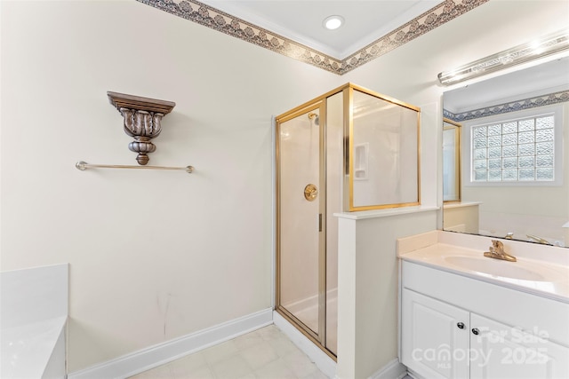 bathroom with vanity and a shower with shower door