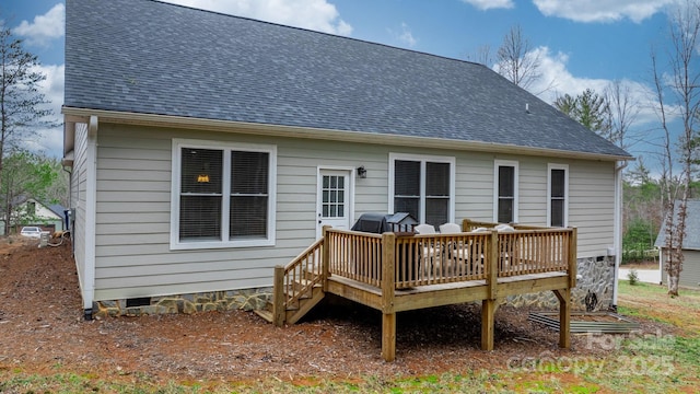 rear view of house with a deck