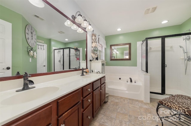 full bathroom with a bath, a stall shower, double vanity, recessed lighting, and stone finish flooring