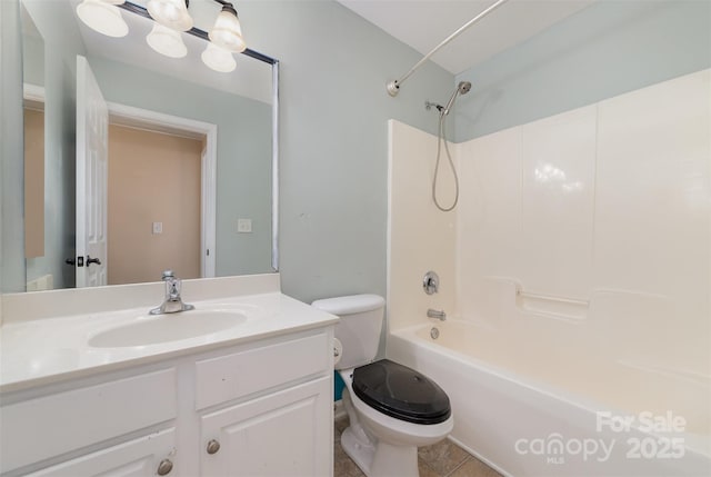 bathroom with toilet, bathing tub / shower combination, and vanity