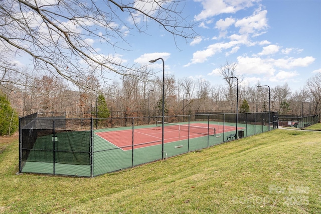 view of tennis court with community basketball court