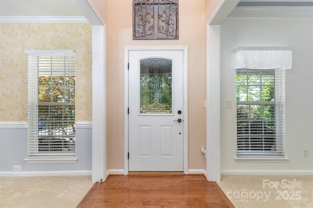 1245 Periwinkle Dr, Waxhaw, NC 28173 - entryway with ornamental molding and wood finished floors