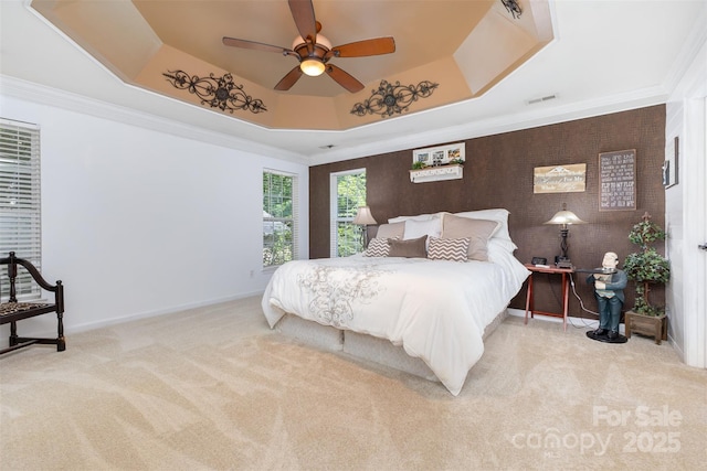1245 Periwinkle Dr, Waxhaw, NC 28173 - carpeted bedroom with a raised ceiling, a ceiling fan, and crown molding
