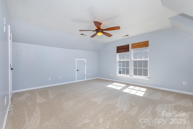 1245 Periwinkle Dr, Waxhaw, NC 28173 - additional living space with vaulted ceiling, carpet flooring, and a ceiling fan
