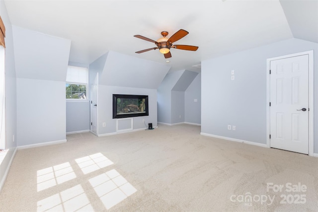 1245 Periwinkle Dr, Waxhaw, NC 28173 - additional living space with ceiling fan, vaulted ceiling, and carpet