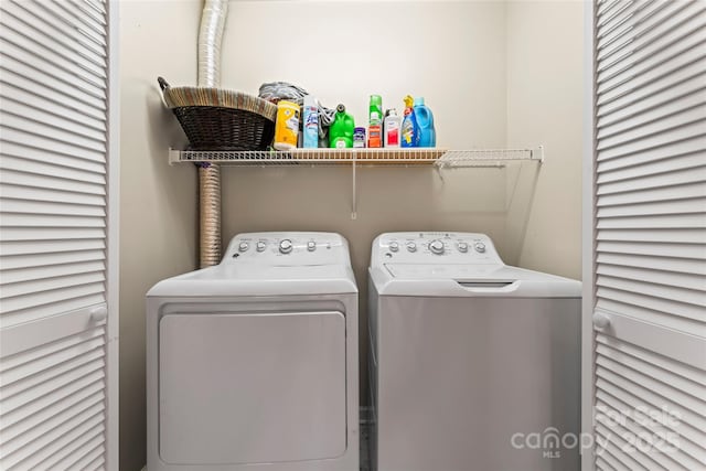 laundry room featuring independent washer and dryer