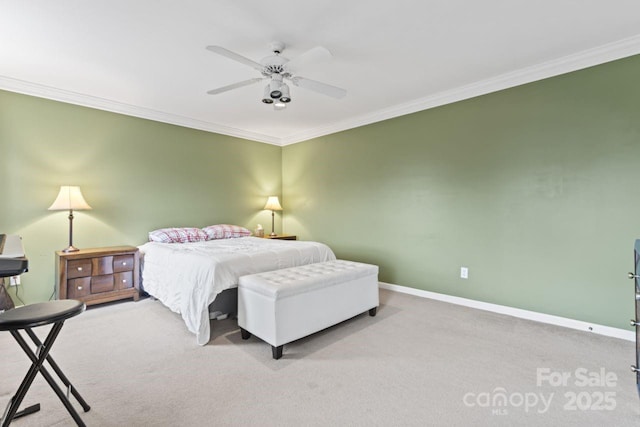 carpeted bedroom featuring ceiling fan and ornamental molding